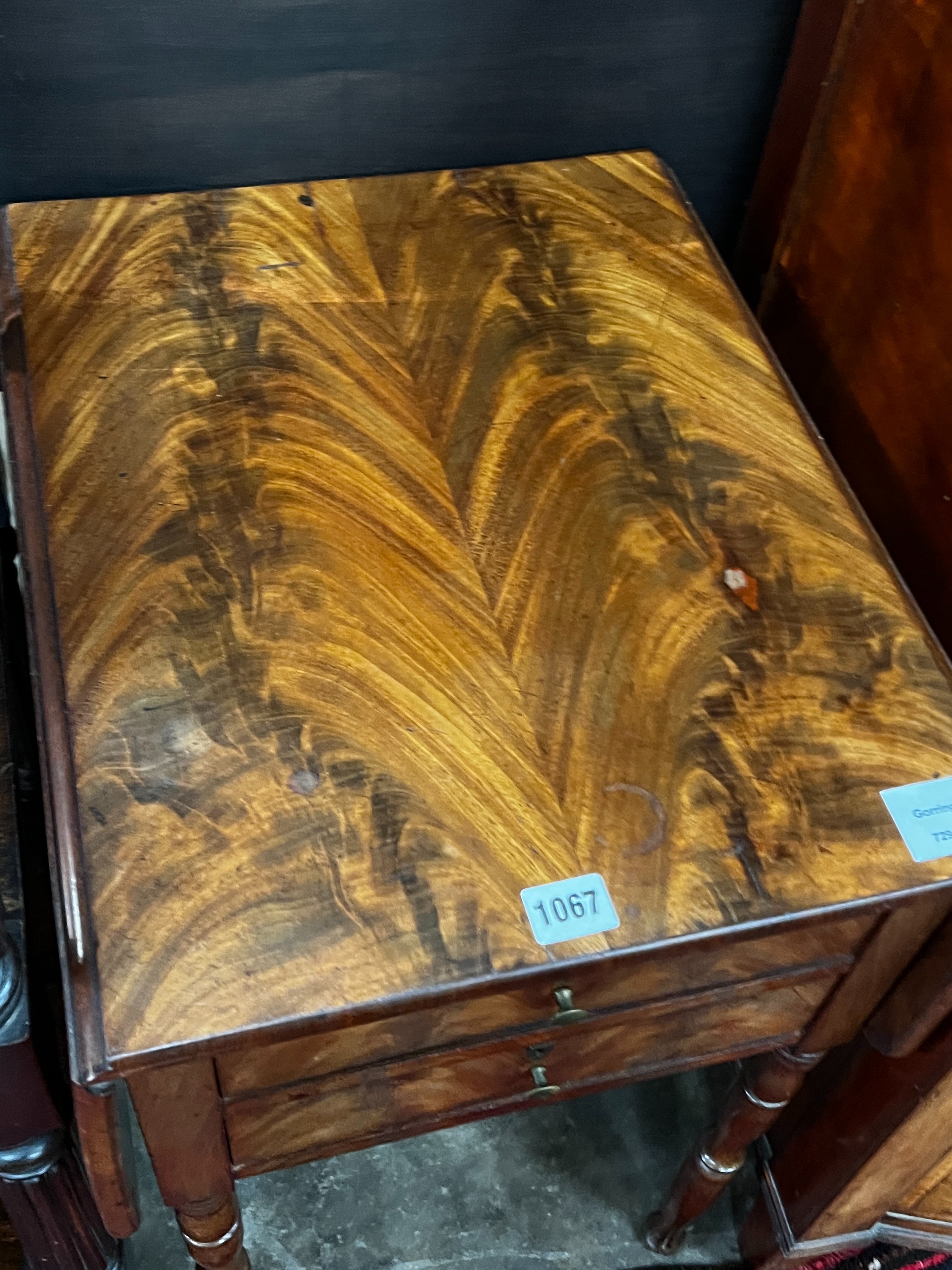 A 19th century French mahogany drop flap work table, width 38cm, depth 47cm, height 63cm